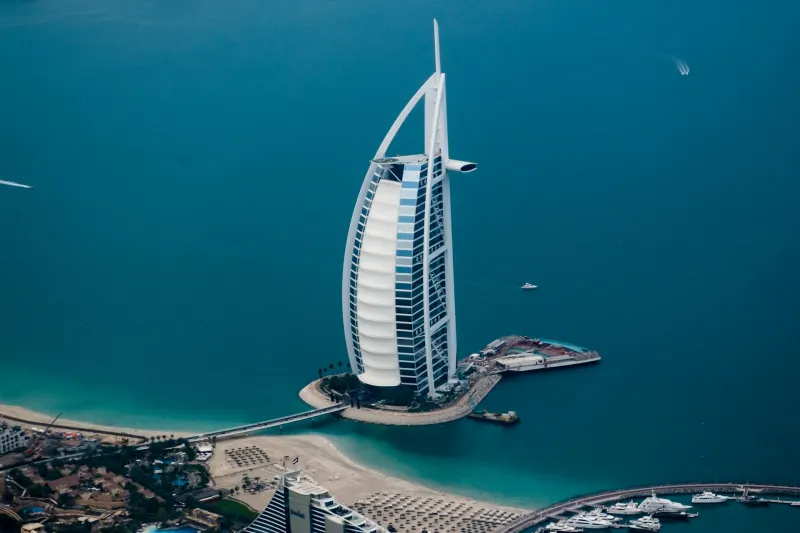 Aerial view of Burj Al Arab and the Palm Jumeirah in Dubai